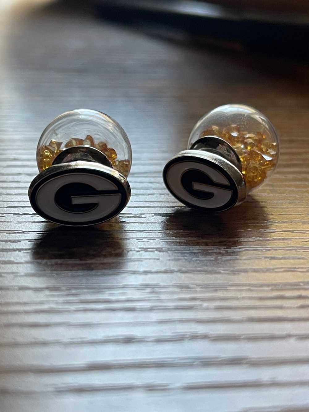 Greenbay Packer ball back Stud Earrings with Gold Bead Fill